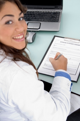 Smiling Doctor Holding Pen by imagerymajestic [ID-100120039]